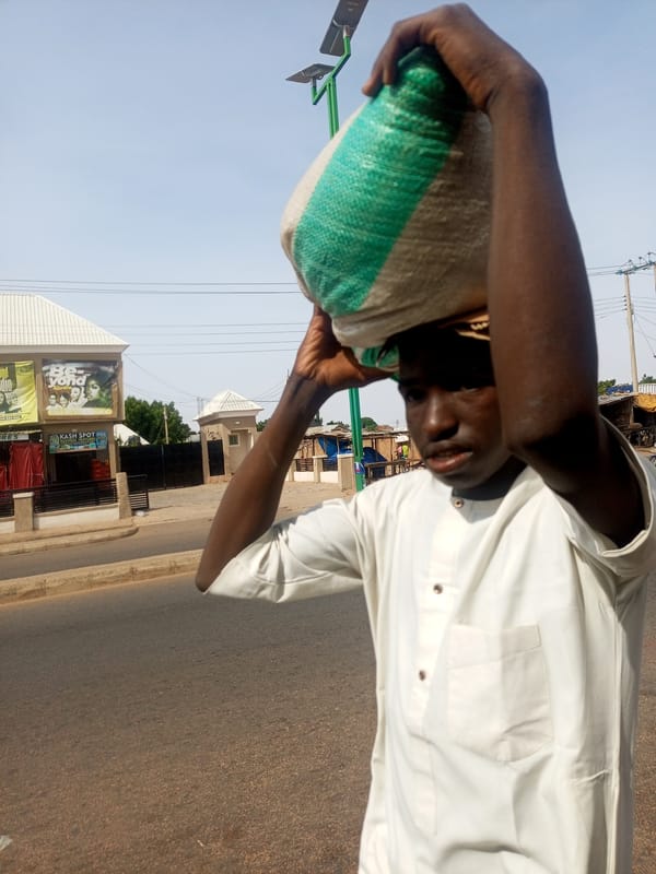 Daily life unfolds across Nigerian towns during morning hours