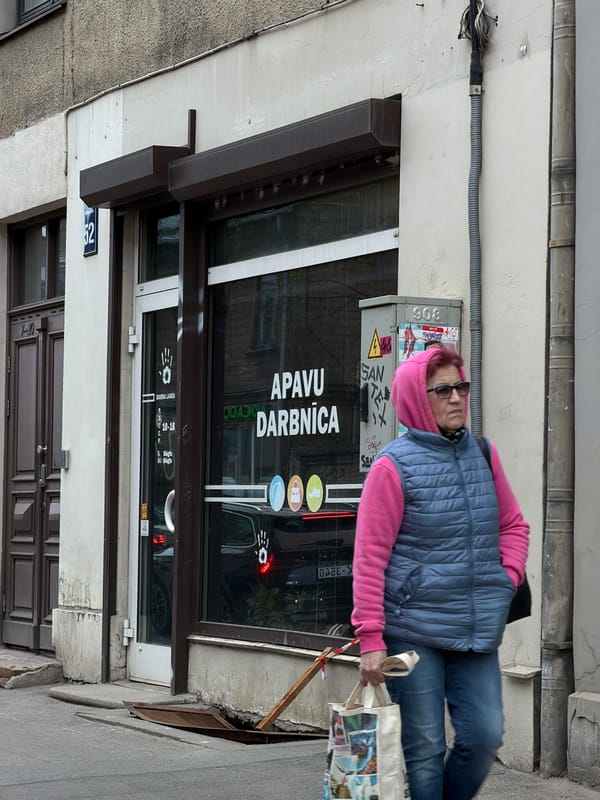 Ordinary street life documented in Riga during afternoon hours