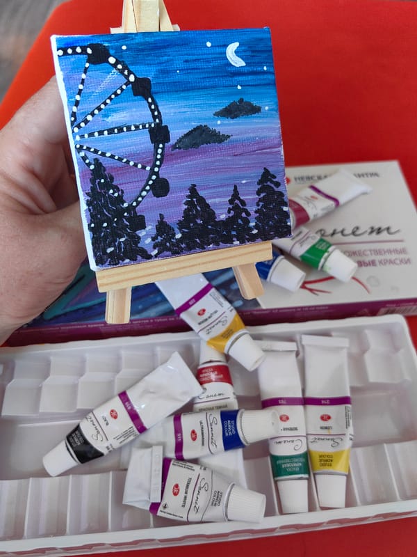 Miniature night-scene Ferris wheel painting on easel, Sochi