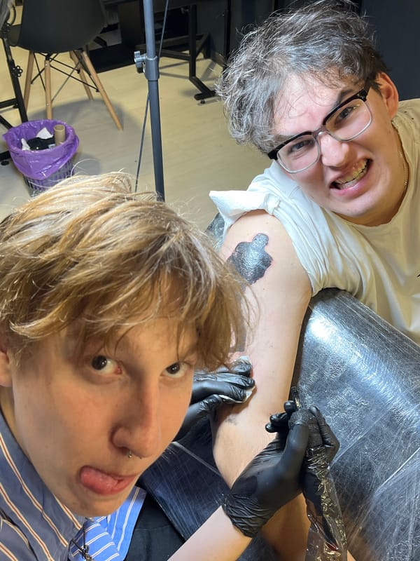 Person gets fresh botanical tattoo in Perm, Russia