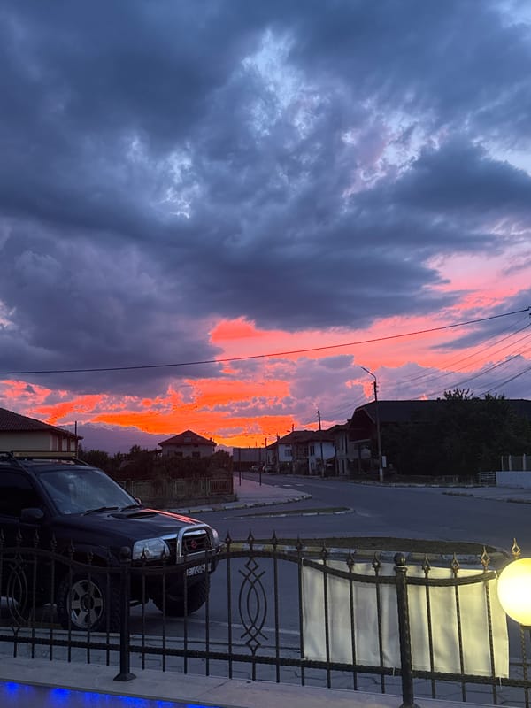 Dramatic sunset illuminates Blatska, Bulgaria amid storm clouds