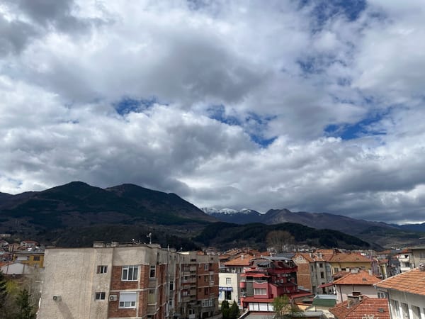 Elevated views document Goce Delchev cityscape under cloudy skies