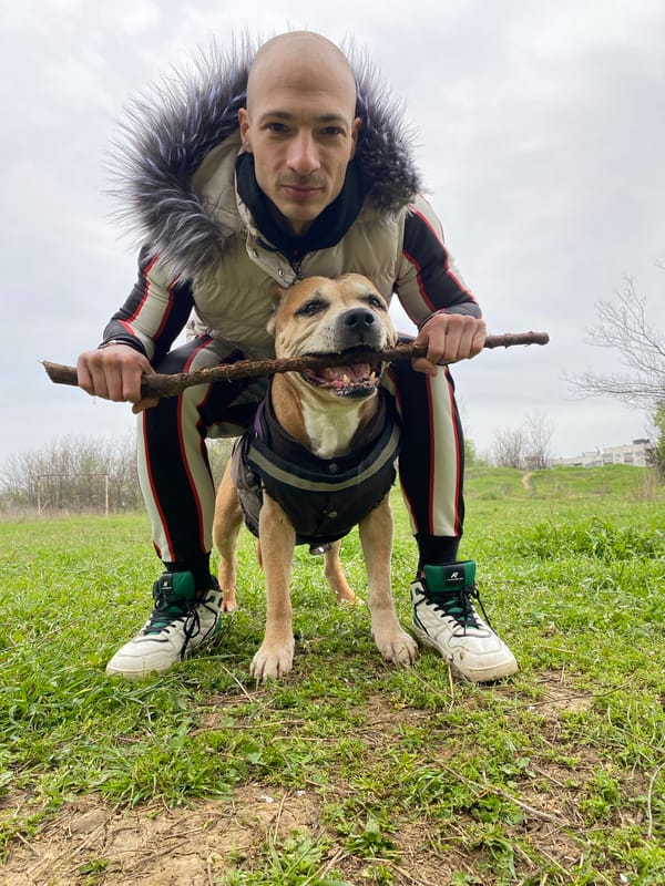 Man plays with dog in Pleven park Saturday morning