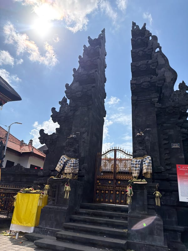 Morning street life along a busy Kuta, Bali block