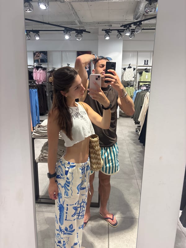 Mirror selfies in a Varna clothing store, summer 2026