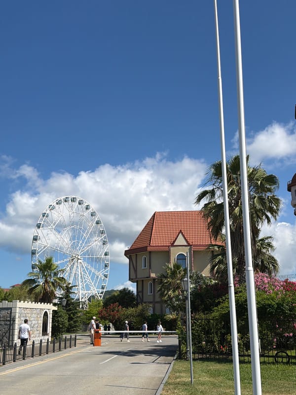 Sirius resort district: hotels, rides, and grounds on a summer morning
