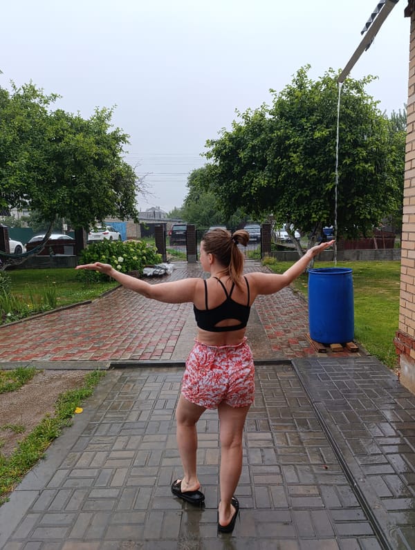 Rainy morning: outdoor wandering, rain play, and dog-meets-cat standoffs