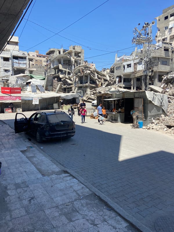Street-level views of destruction and makeshift shelter in Gaza City