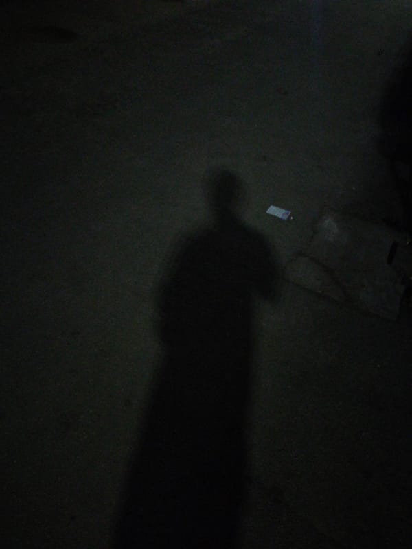 Nighttime street scenes captured near Lagos beauty salon