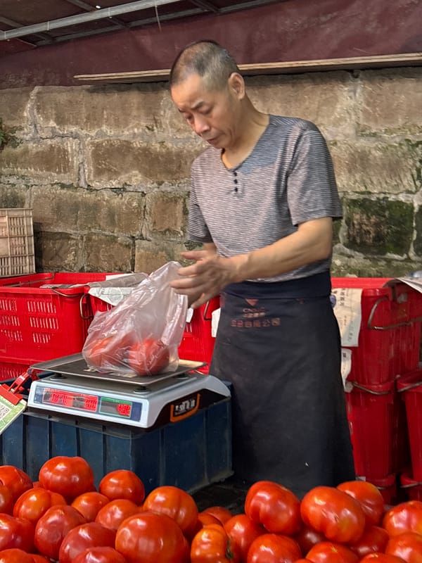 Evening street life documented in Jiangjin market district