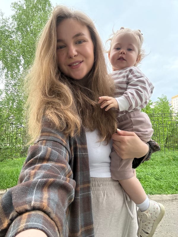 Mother and toddler enjoy afternoon playground visit in Vladimir
