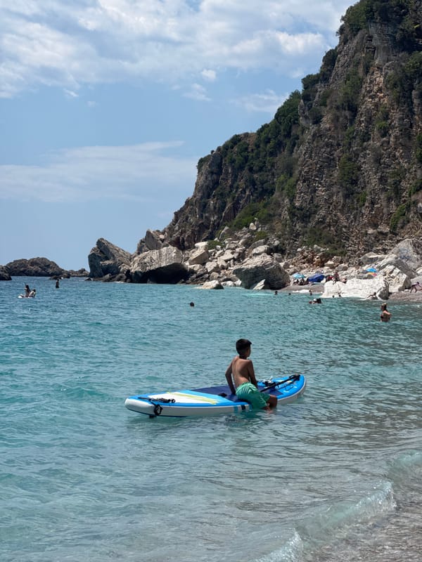 Summer day on the pebble beach at Mirište, Montenegro