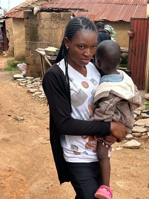 Everyday street life across Jos, Nigeria on a July morning