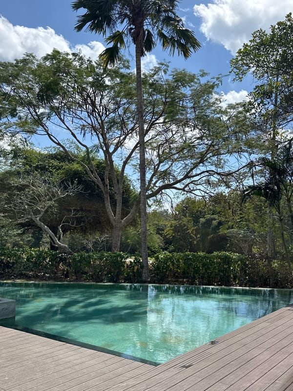 Resort day in Kuta Selatan: pool, selfies, and an indoor event