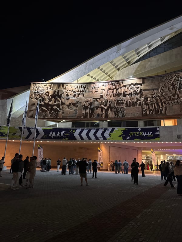 Evening gathering outside decorated building in Yerevan, Armenia