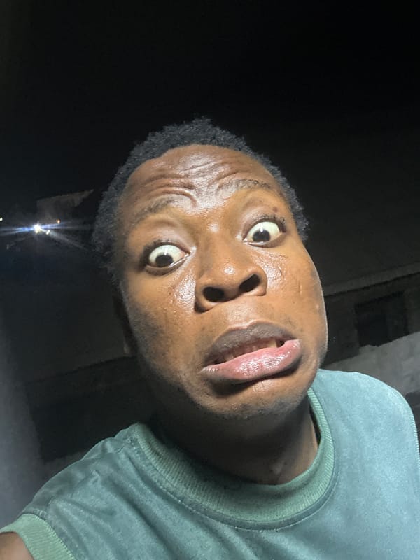 Person Takes Multiple Selfies Under Streetlight, Shows Perspiration