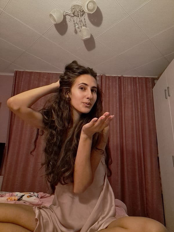 Bedroom selfie session in a pink room, Sofia