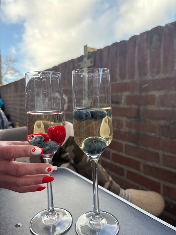 Champagne glasses with berries photographed in The Hague