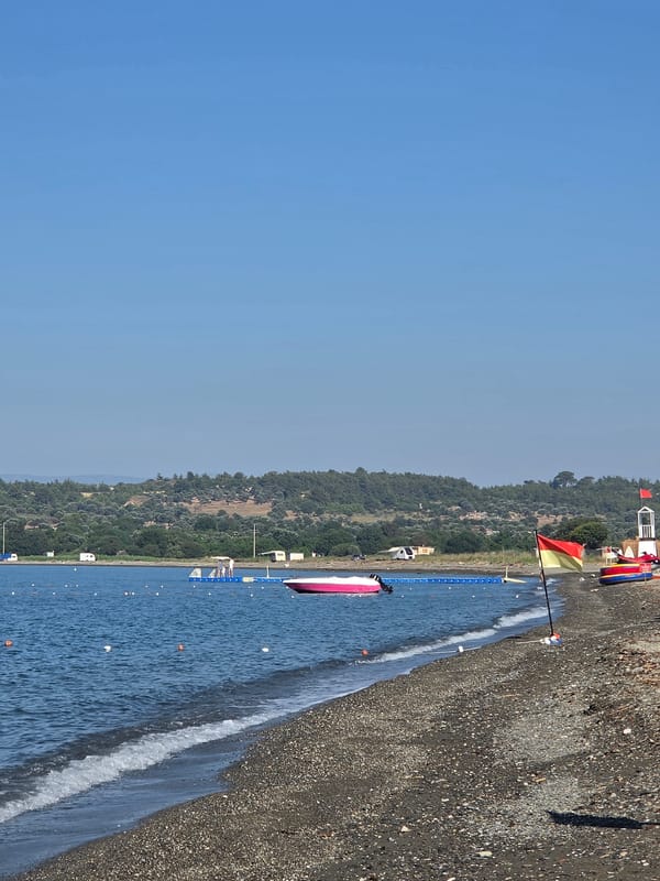 Quiet morning at a pebble beach in Seferihisar, Turkey