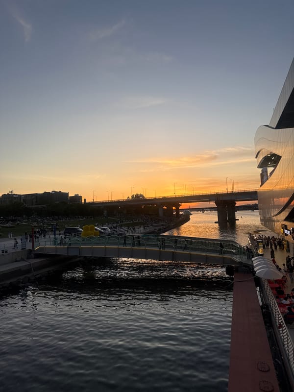 Seoul waterfront scenes include street performance, sunset views
