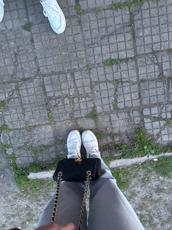 Person stands on weathered concrete tiles in Lehchevo, Bulgaria