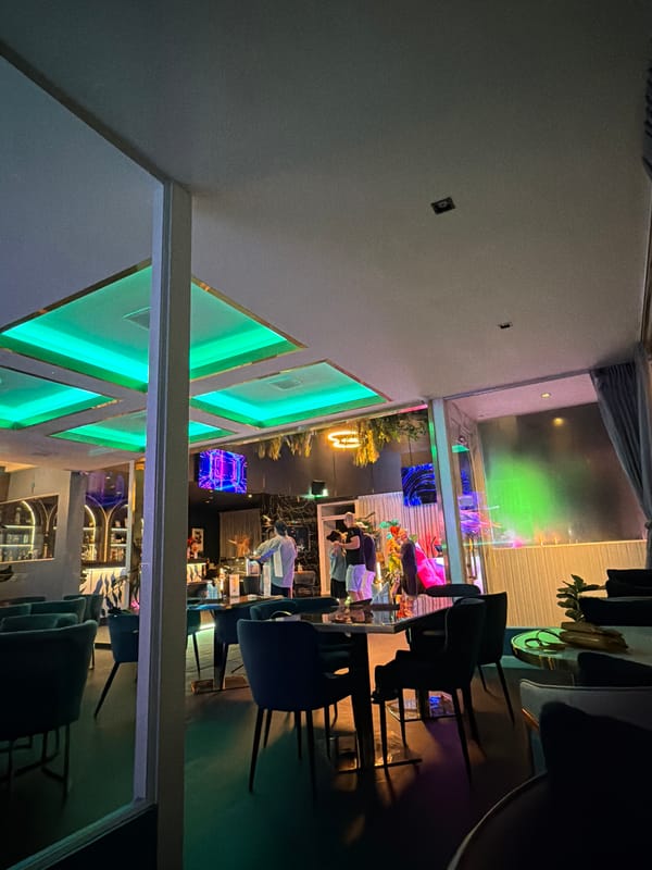 Inside Tempo lounge: neon lights, dancing, and social vibes