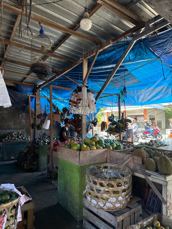 Two people spotted near traditional Balinese structure in Kutuh