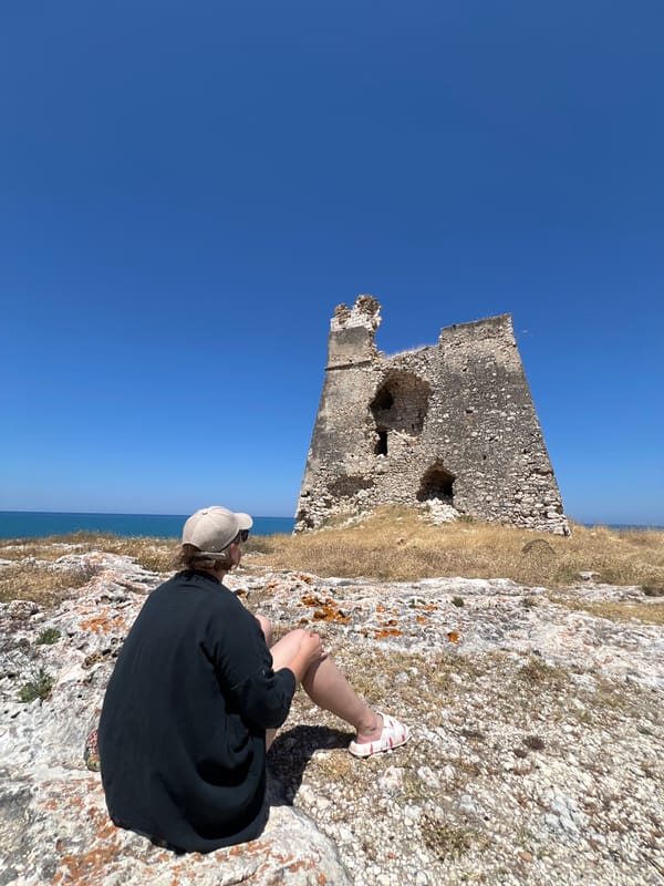 Clifftop break beside an old stone tower, Peschici coast