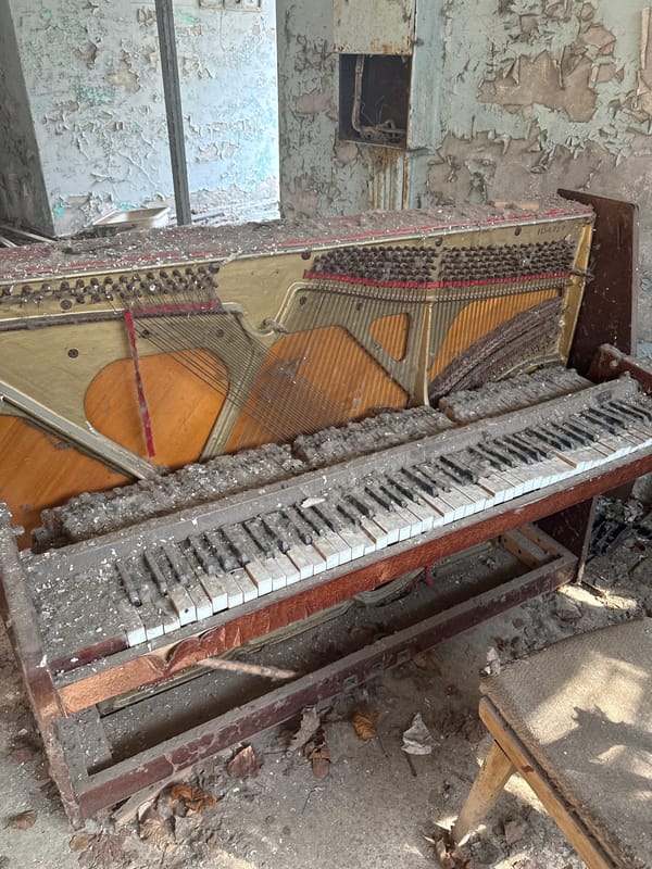Decaying piano documented in abandoned Prypiat building