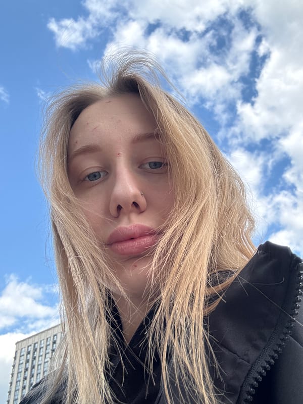 Young woman takes outdoor selfies in Rostov-on-Don