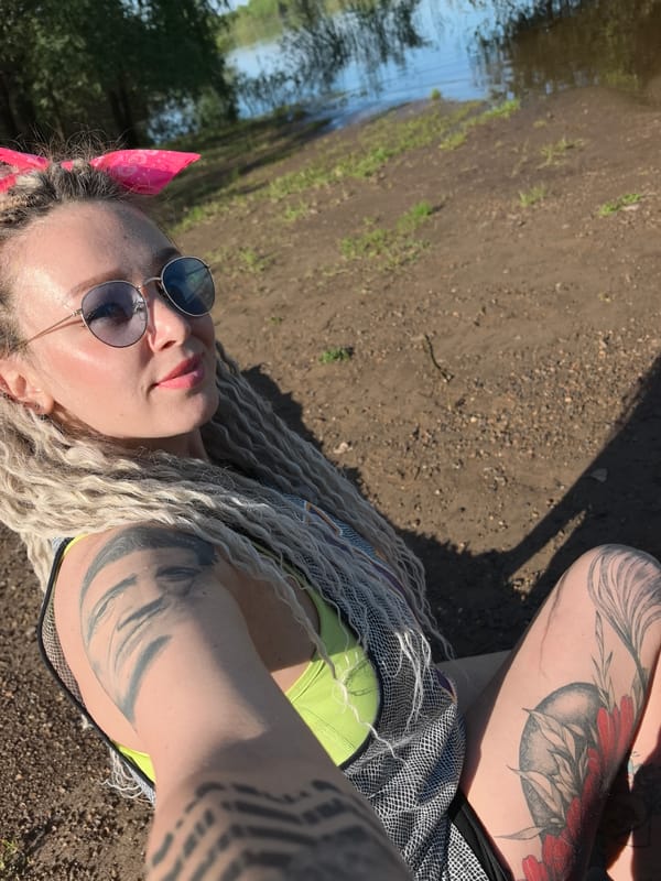 Woman observed near algae-covered waterway in Noviy, Russia