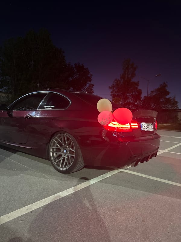 21st Birthday Celebration Held in Parking Lot with Decorated Cars