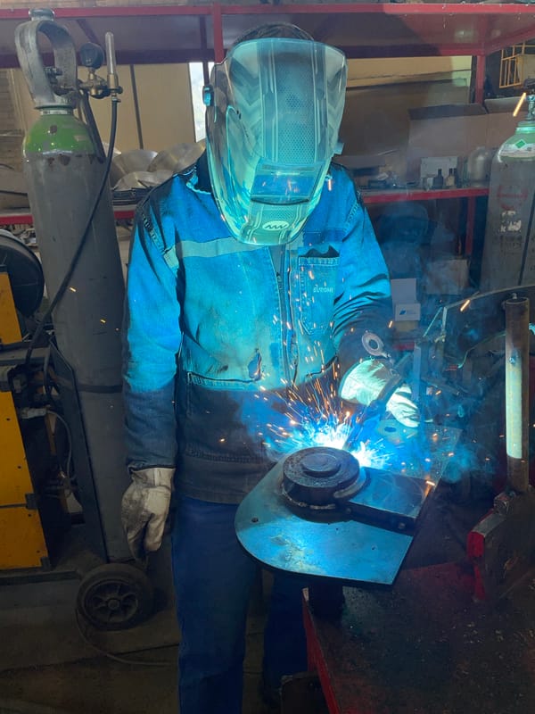 Welder conducts morning metalwork operations in Zaljevo workshop