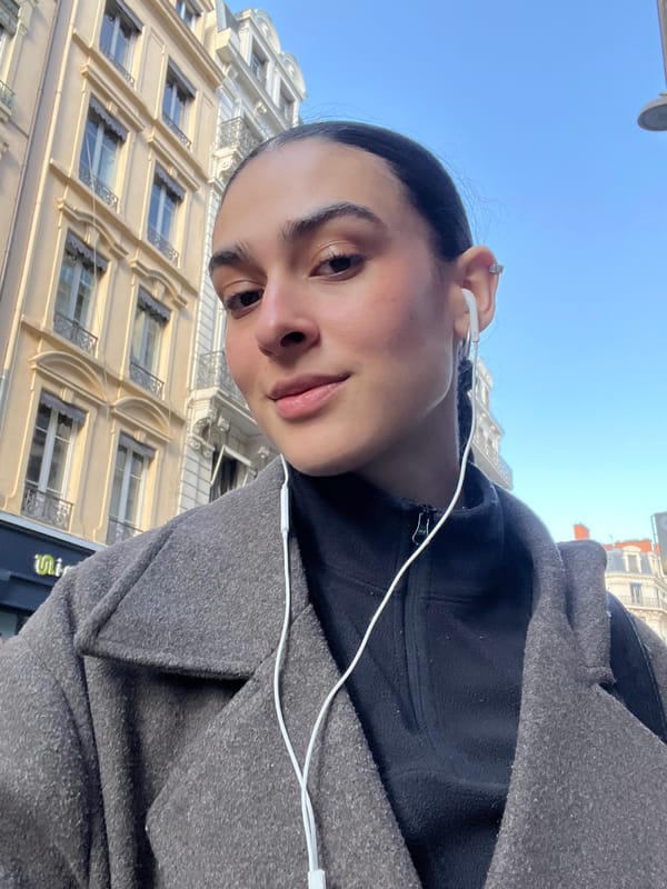Person takes sunny day selfie in Lyon, France