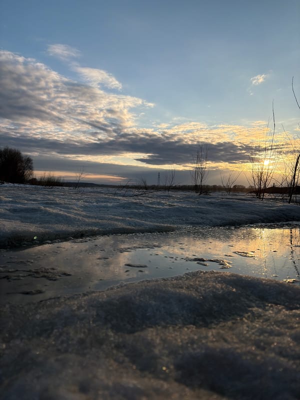 Winter river scenes documented during golden hour in Chaikovsky Russia