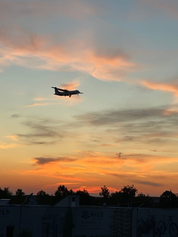 Aircraft observed during dramatic sunset near Bucharest airport