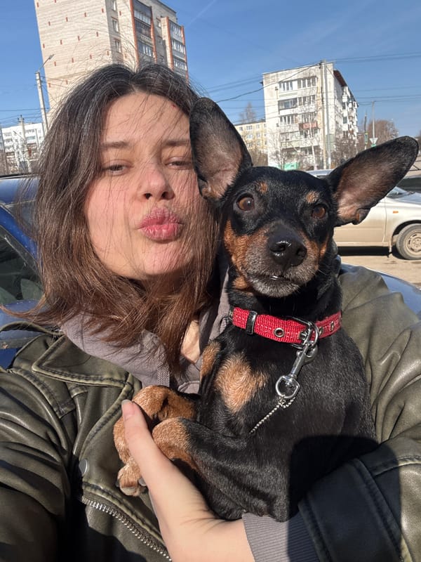 Morning moments captured in Chaikovsky: woman, pets, daily life
