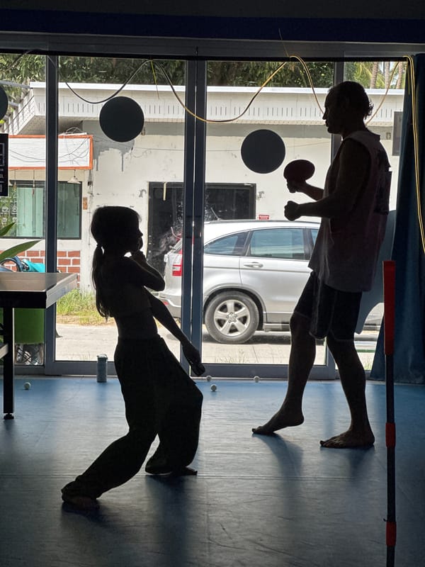 Ping pong lesson captured at Thailand recreation center