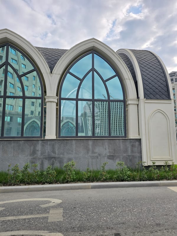 Modern arched architecture on a Grozny street