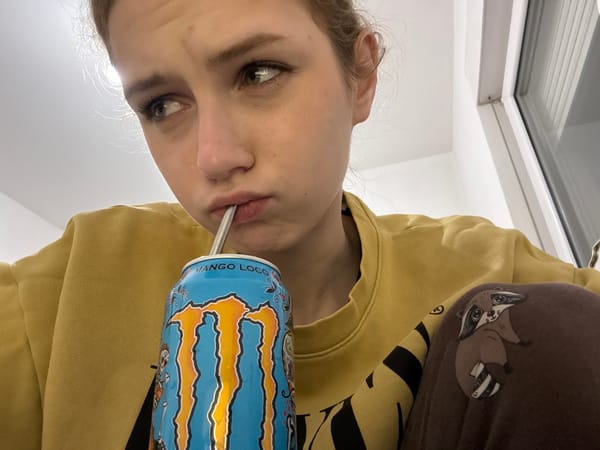 Person drinks Monster energy drink in Kragujevac, Serbia