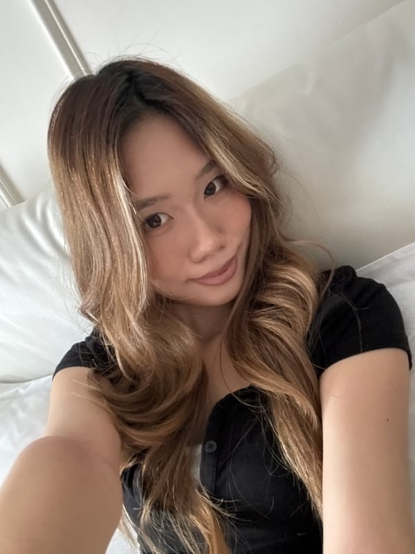 Woman takes morning selfies in Yuzhong District indoor location
