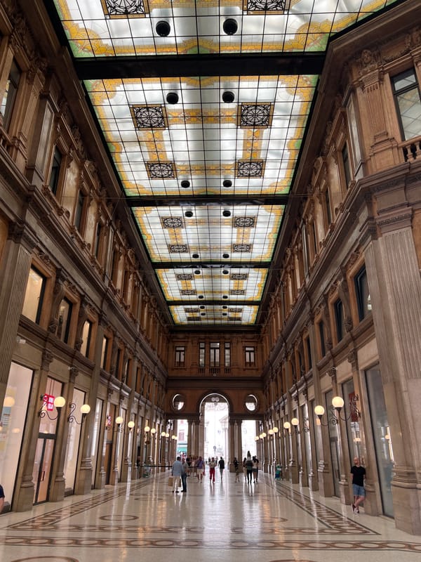 Tourist documents Rome landmarks during afternoon walking tour