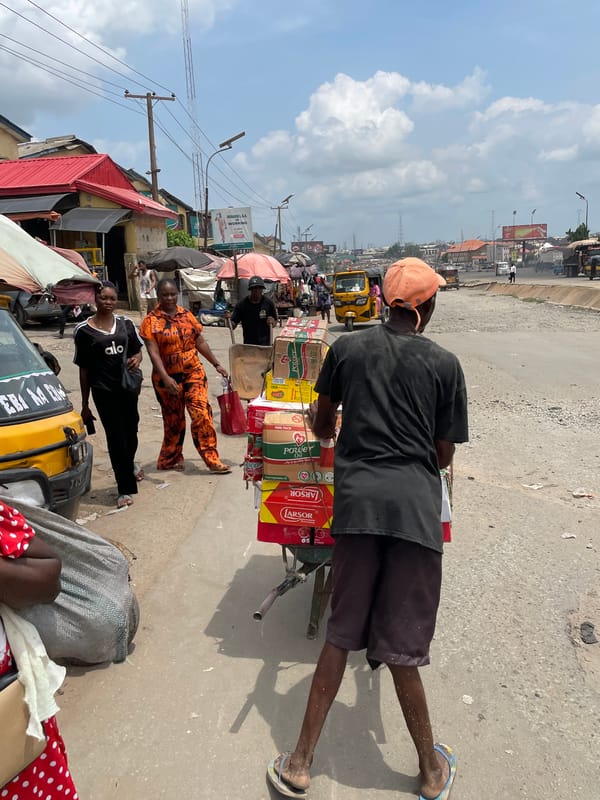 Daily market life documented across Nigerian commercial districts