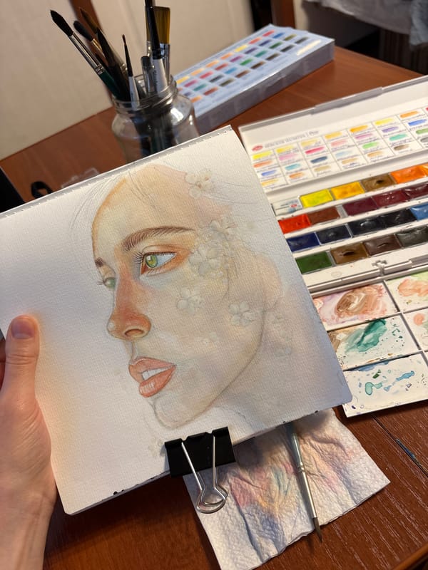 Artist creates watercolor portrait with floral details in Izhevsk