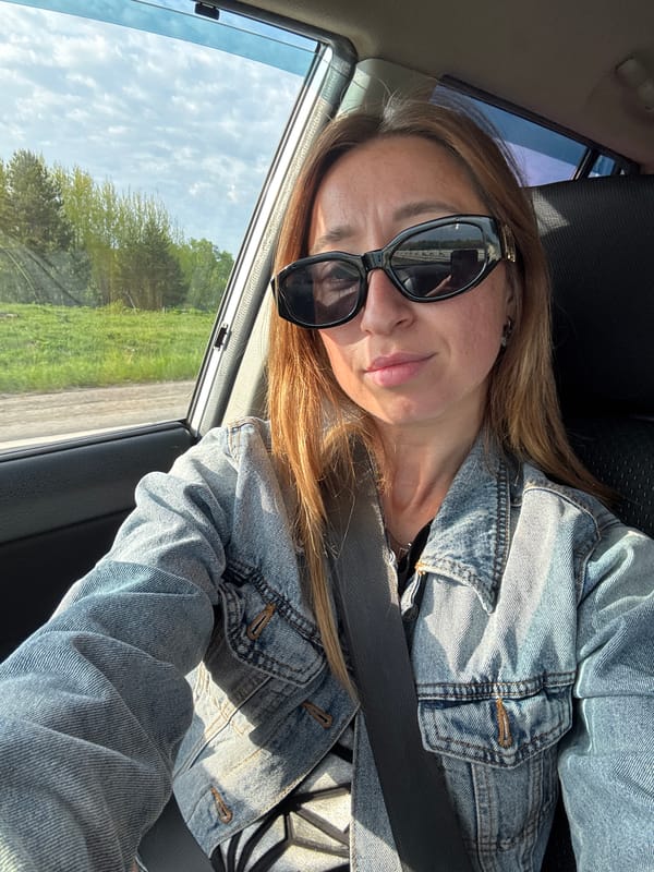 Woman travels by car near Kabanov Mys, Russia