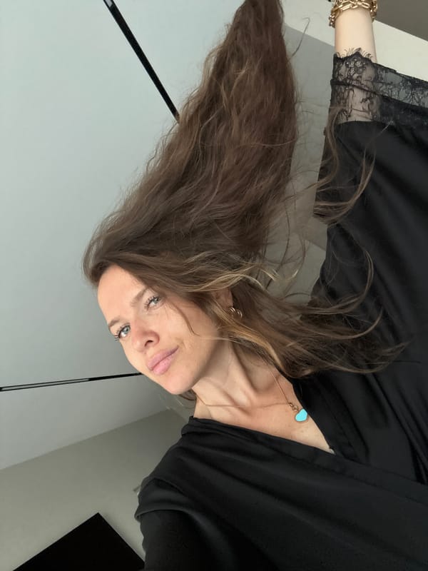 Back-to-back selfies in Dolgoprudny, lace top and turquoise pendant