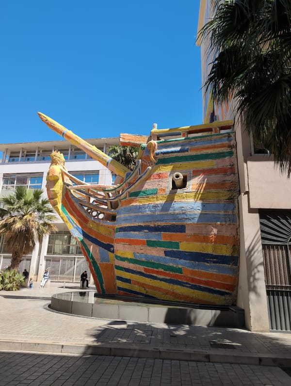 Tourist explores Toulon's maritime museums and decorated streets