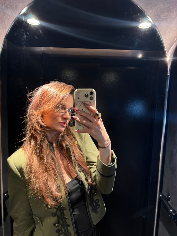 Mirror selfie captured in indoor Athens location