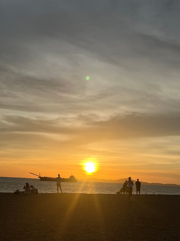 Evening beachfront life captured in Pattaya City, Thailand