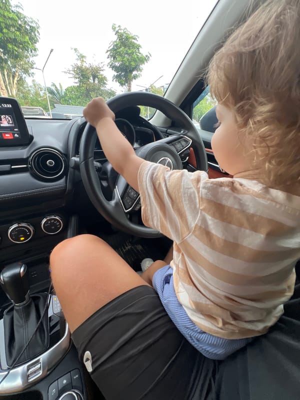 Family playground, beach, and car adventures captured throughout morning